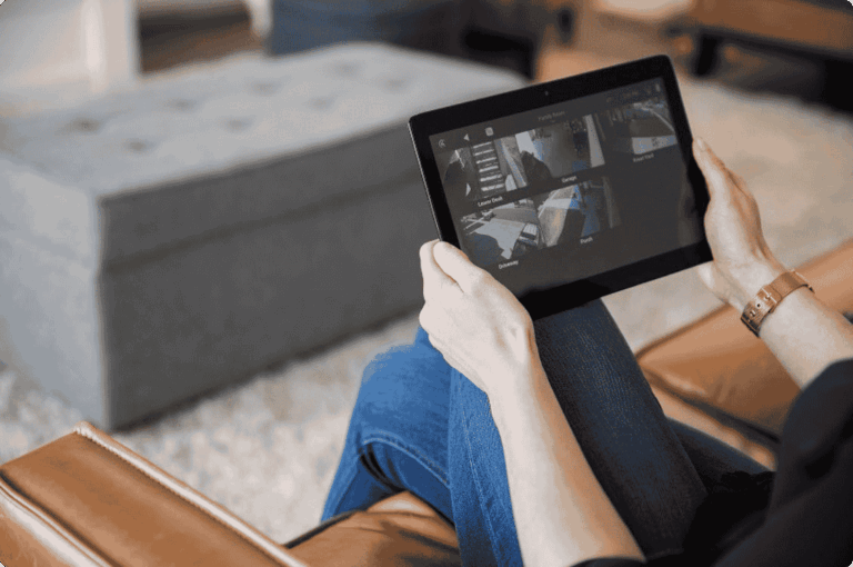 Fort Collins smart home security interface with camera and access control views